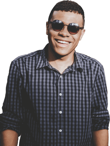 A young smiling man with sunglasses